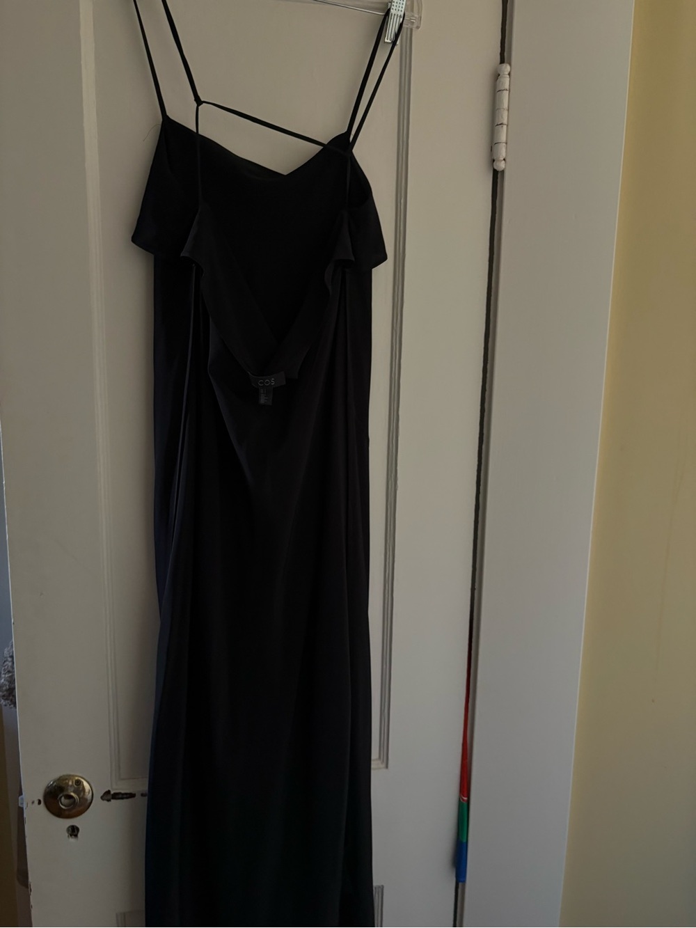 COS black sleeveless bias cut slip dress.